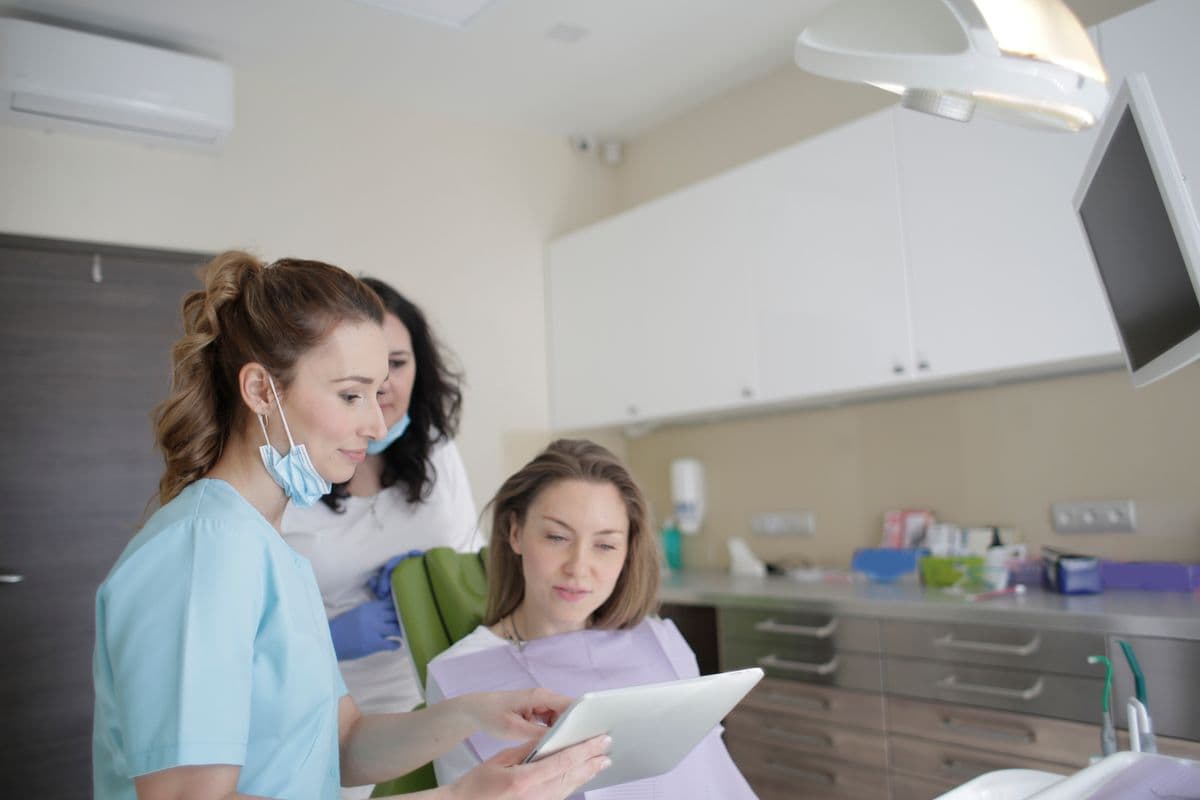 A dentist reviewing a treatment plan with a patient